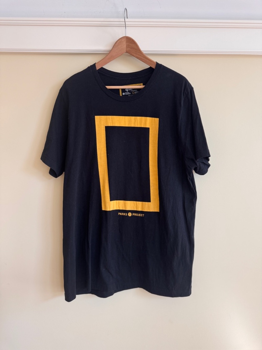 Parks Project Black Short Sleeve Tee with Yellow Rectangle Logo
